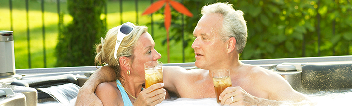 Couple having a great time in a hot tub